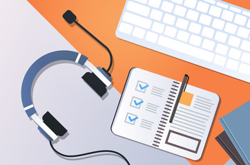 Poster - call center manager workplace support service concept top angle view desktop with headphones organizer notepad keyboard office stuff horizontal