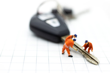 Miniature people : Car repair workers for return to use. Image use for maintenance, warranty, business concept.