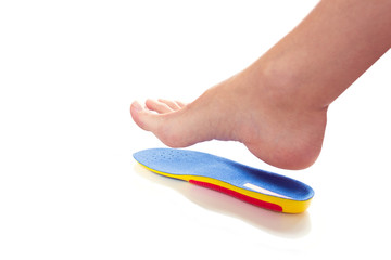 Wall Mural - orthopedic insole and female leg