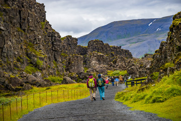 thingvellir national park, pingvallavatn huge tectonic plates drifting cracks and tourists on icelan