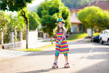 Wall Mural - Child on inline skates. Kids skate roller blades.