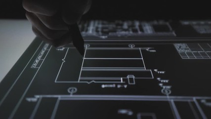 Wall Mural - creative architect designer working with drawings on pen display tablet at night office. using inter