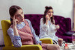 © zinkevych - Skeptical unhappy girl in pink dress being unsatisfied with her friend