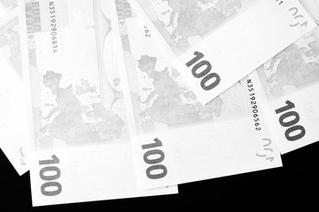 One Hundred euro banknotes as a background close up. Black and white