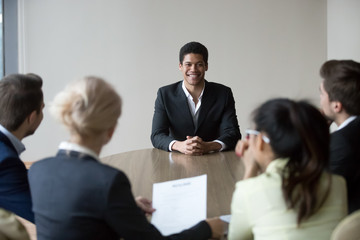 Wall Mural - Smiling african male applicant feeling confident prepared to get job