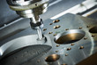 grinding or polishing metal detail on CNC machine.