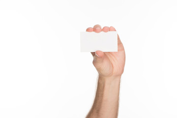 partial view of man holding blank and empty card with copy space