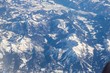 © Riko Best - Aerial view of snow covered mountains - snowy mountain peaks - high mountains - Alps
