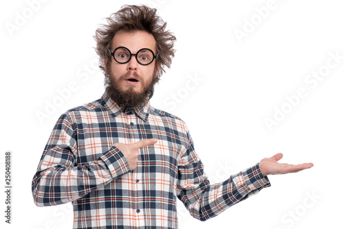 Crazy Bearded Man With Funny Haircut In Eye Glasses Showing