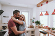 © Yakobchuk Olena - Beautiful happy couple sharing tender moment at home
