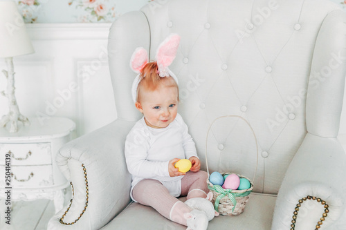Little Child Girl Wearing Bunny Ears On Easter Day Girl Holding