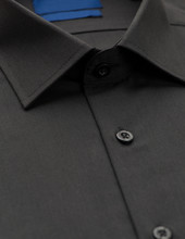 Black Shirt With A Focus On The Collar And Button, Close-up
