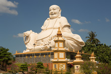 Big Laughing Sitting Outdoor Buddha In Vinh Trang Pagoda In South Vietnam