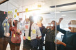 © Flamingo Images - Ecstatic group of businesspeople cheering together during a brai