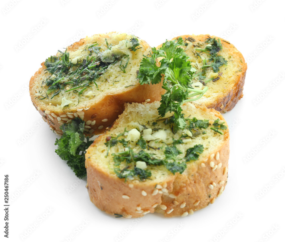 Tasty cut garlic bread on white background