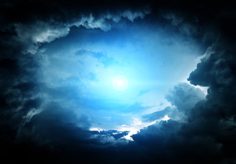 Wall Mural - cloudscape with a light