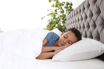 Sticker - Cute little African-American boy sleeping in bed