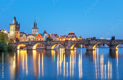 Scenic View On Vltava Rive Charles Bridge And Historical