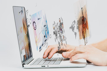 Poster - Digital virtual technology. Businessman uses a laptop in a virtual digital world.
