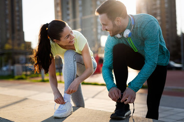 Wall Mural - Handsome man and attractive woman talking