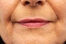 Beauty, Make Up And Old People Concept - Close Up Of Senior Woman Lips