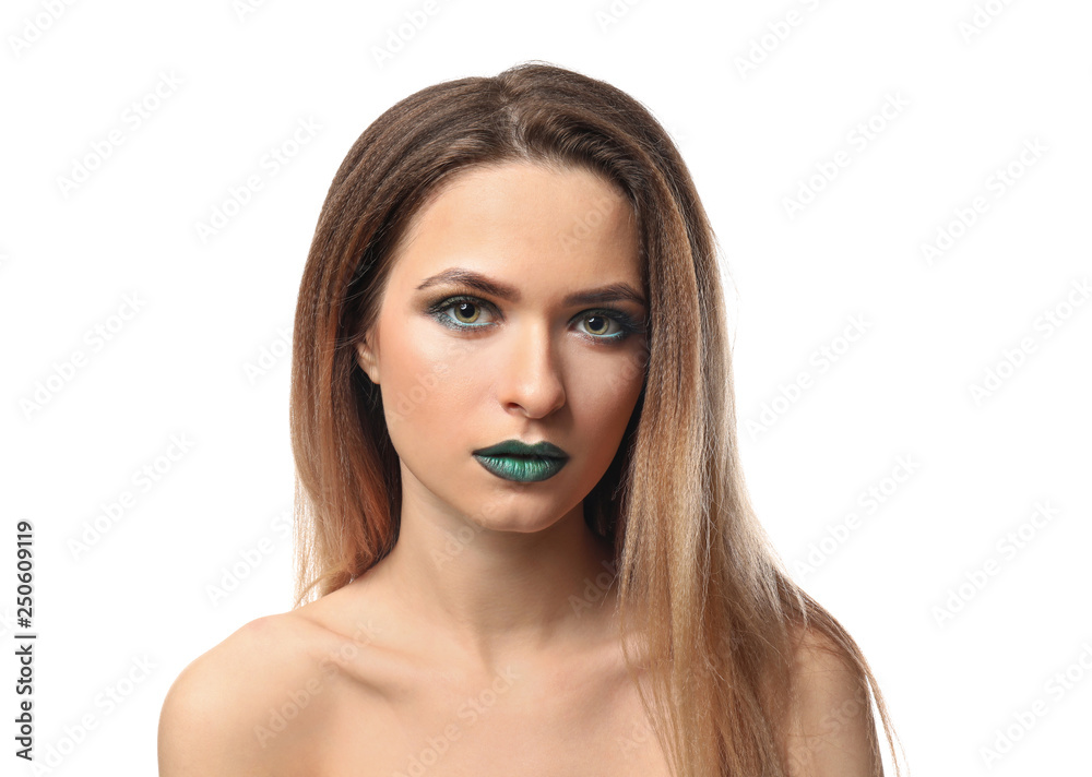 Beautiful young woman with bright makeup on white background