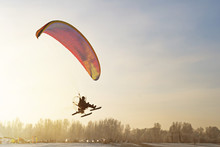 Flight On A Motorized Paragliders In The Winter