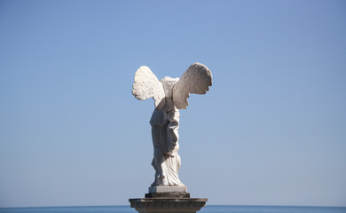 Statue of Winged Victory of Samothrace (called Nike of Samothrace) in the Park Aivazovsky in Crimea 