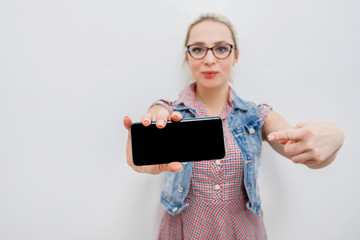 girl with phone on a white background