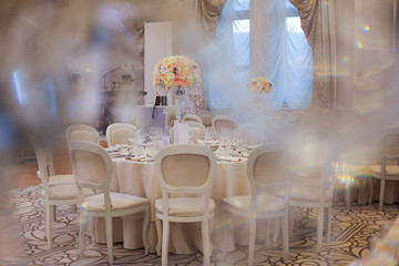Wall Mural - Elegant wedding reception table arrangement, floral centerpiece