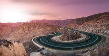 Serpentine Road In Pink Mountains On Sunset