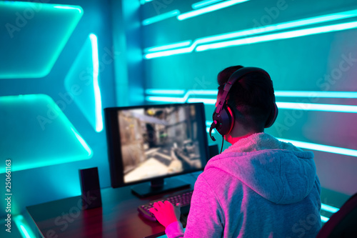 Young Asian cyber sport gamer Wallpaper Mural