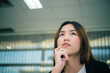 © reewungjunerr - Asian businesswoman stress from hard work,Thai worker woman working in the office,Woman thinking concept