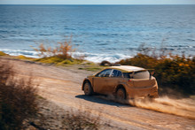 Rally Racing Car In Dirt Track