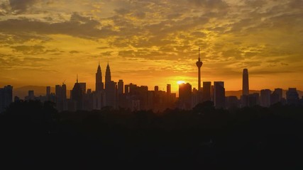 Wall Mural - 4K Timelapse of Kuala Lumpur city skyline during sunset