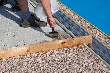 Laying the floor around the outdoor pool.