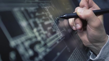Wall Mural - creative designer architect working with drawings on the interactive screen pen tablet