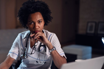 Wall Mural - Portrait of African American female doctor at doctor's office.