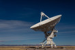© Natalie Schorr - Very Large Array VLA radio antenna dish on pad in the New Mexico desert listening to the cosmos, horizontal aspect