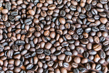 Roasted brown coffee beans, can be used as a background and texture