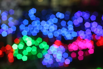 Beautiful bokeh of night decoration during Christmas time in the city.