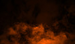 © Victor - Orange smoke stage studio. Abstract fog texture background for graphic and web.