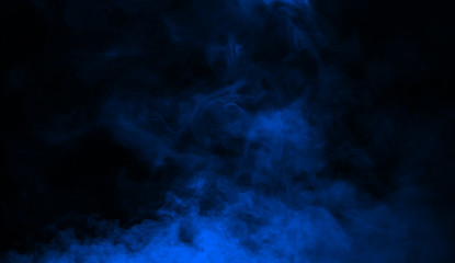 abstract blue smoke mist fog on a black background. texture background for graphic and web.