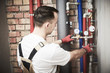 © Kadmy - plumber installing and mounting water equipment - meter, filter and pressure reducer