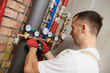 © Kadmy - plumber installing and mounting water equipment - meter, filter and pressure reducer