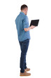 © ghoststone - Back view of a man who is standing with a laptop.