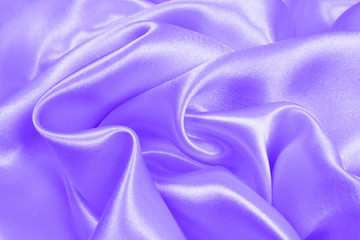 Beautiful smooth elegant purple silk or satin texture can use as abstract background. fabric color