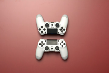 Poster - video game controllers isolated on red background