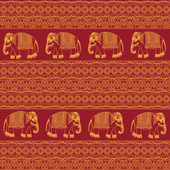 Indian traditional pattern with elephants on red background. Seamless pattern