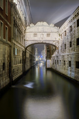 Wall Mural - Rio di Palazzo (aka narrow canal), between the Palace of Doge and the prisons. The famous Bridge of Sighs spans the canal.Venice ,Italy.